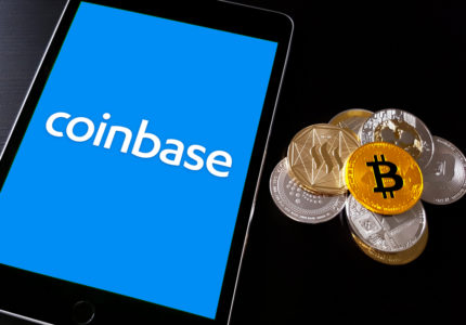 Coinbase,Cryptocurrency,Exchange,Logo,On,Ipad,Smart,Device,With,Stack