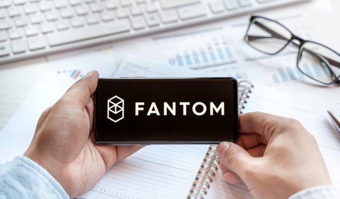 Logo,Of,Fantom,Coin,In,Tablet.,Cryptocurrency,Ftm,Token.,Trading