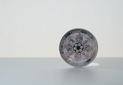 Cardano,(ada),Digital,Crypto,Currency.,Stack,Of,Black,And,Silver